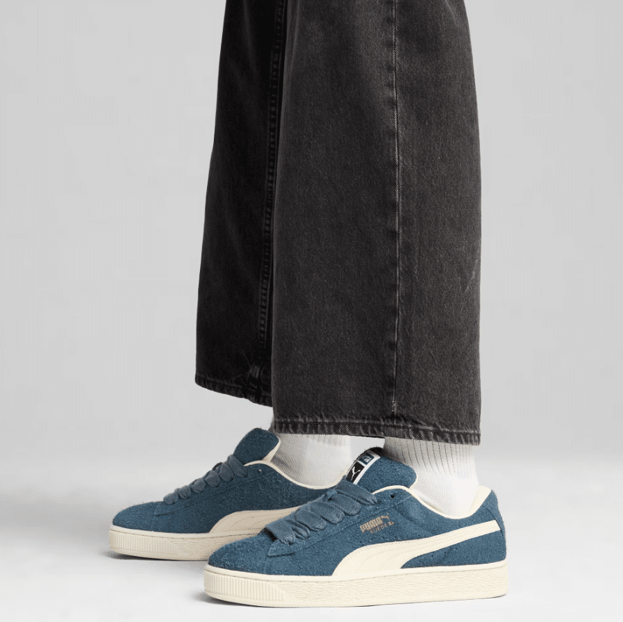 Puma Suede sneakers on feet