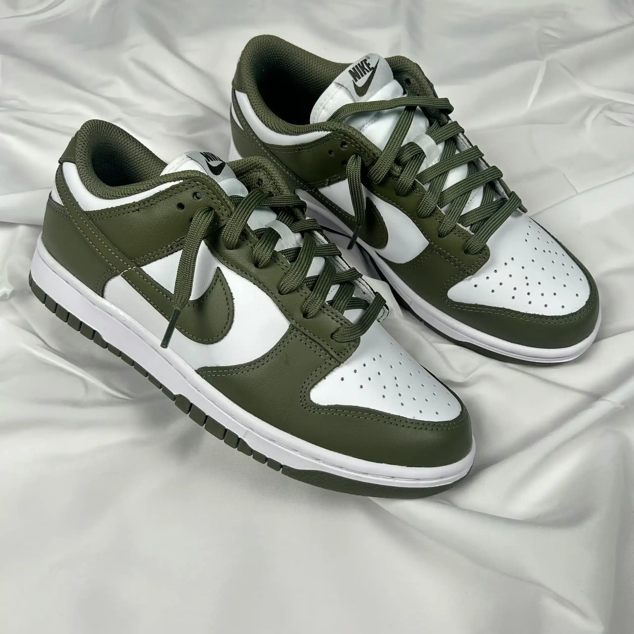 Hoe vallen Nike Dunk Low?